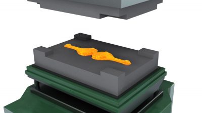 A mechanical press forging a heated blank into the shape of the die impressions.