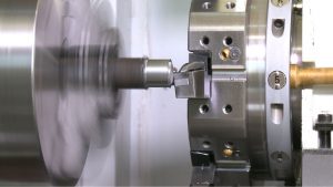 Example of a machine tool removing metal material from a part.