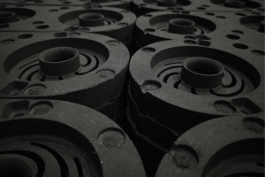 Green sand molds in a foundry prior to molten metal casting