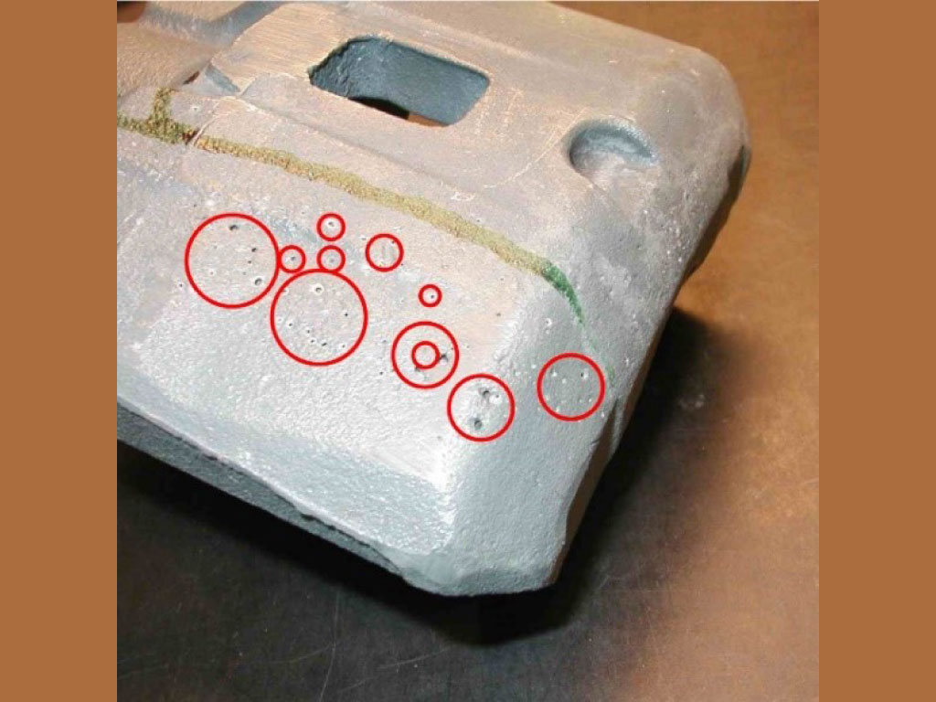 Gas porosity seen on a bonded sand aluminum casting