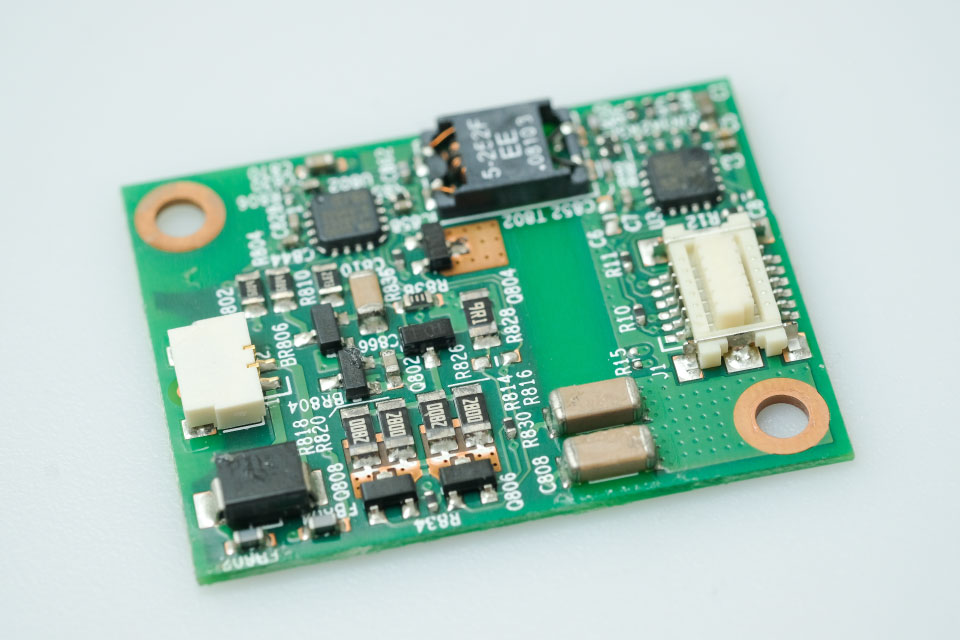 A Printed Circuit Board (PCB) with various electronic components mounted on it.