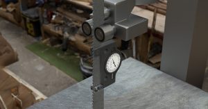 Blade tension is commonly measured using a tension gauge.