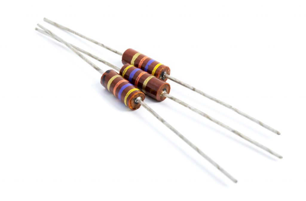 A picture of carbon composition resistors used in radios and TVs in the past, showing how far the evolution of resistor technology has come.