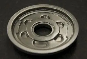 Fine blanking presses can manufacture multi-level parts and part features.