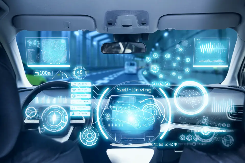Futuristic car interior with digital dashboard and ADAS technology interface displaying navigation and sensor data.
