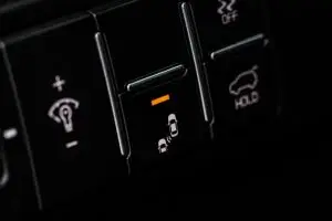 ADAS technology collision warning indicator illuminated on a vehicle dashboard.